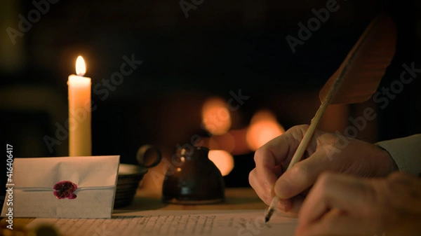 Obraz vintage scene of a man writing with a quill pen in front of a fireplace