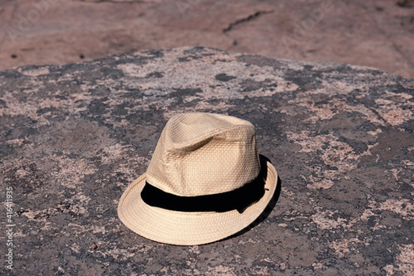 Obraz Straw hat leaning on a rock