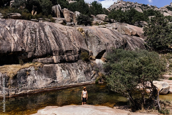 Obraz Woman in a river in the mountains