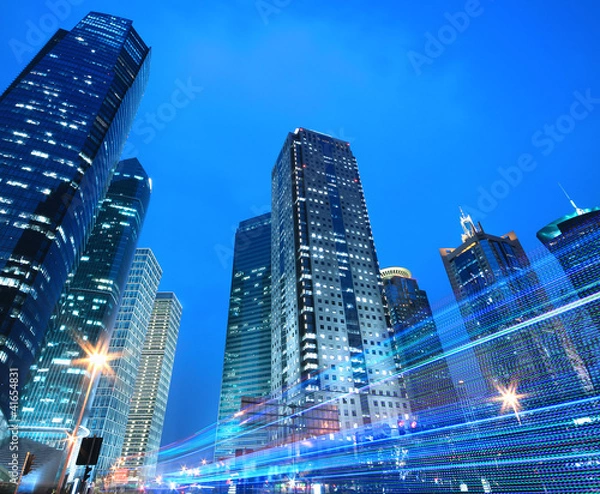 Obraz Modern office building rainbow ray background night