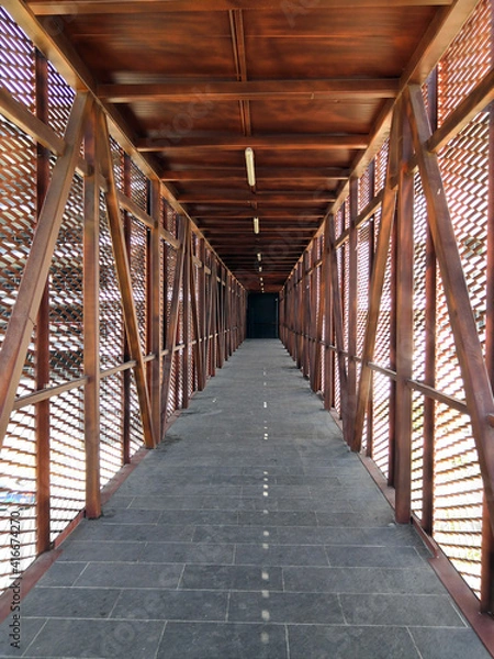 Obraz Corridor with metal fence, blacksmith path
