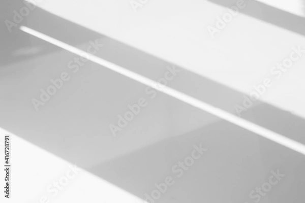 Obraz Abstract shadow and striped diagonal light background on white wall  from window,  architecture dark gray and sunshine diagonal geometric effect overlay for backdrop and mockup design