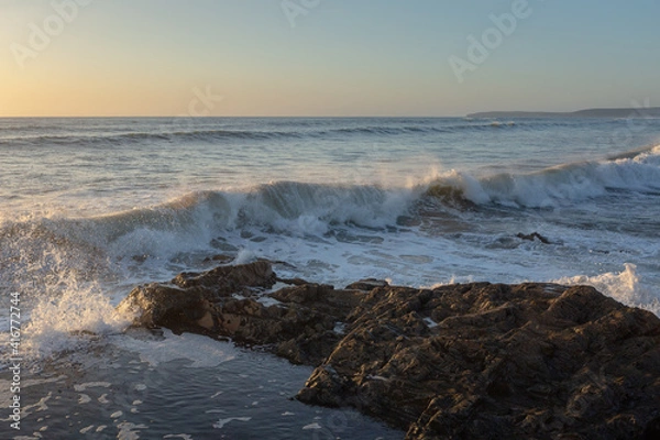 Obraz Waves crash over rocks at Westward ho, Devon