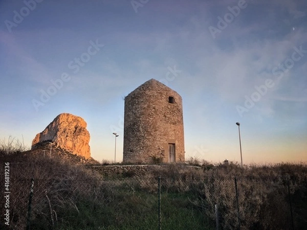 Fototapeta Old abandoned windmill in Calpe