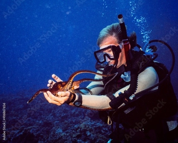 Obraz Scuba diver with octopus bubbles blue ocean