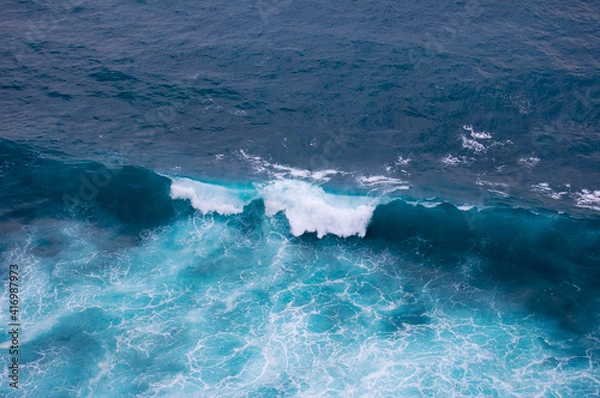 Obraz Sea surface background with waves and foam