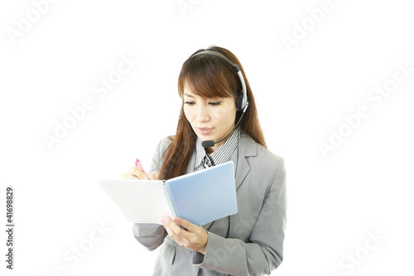 Obraz メモを取るオペレーター