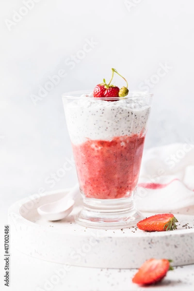 Fototapeta Yogurt Healthy breakfast with berry puree.