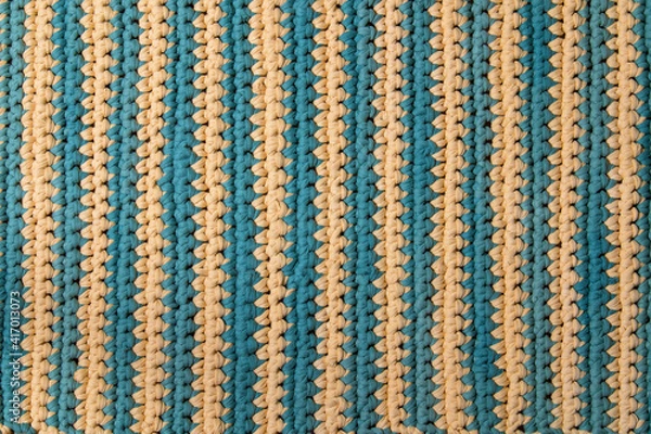 Fototapeta mat made of textile yarn, tied with your own hands