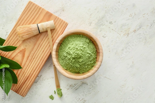 Fototapeta Composition with powdered matcha tea on light background
