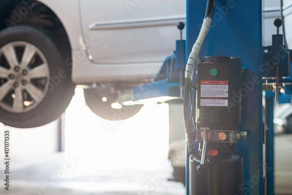 Obraz Mechanic repairing a car