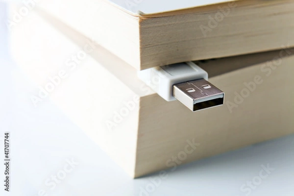 Fototapeta Book with USB plug