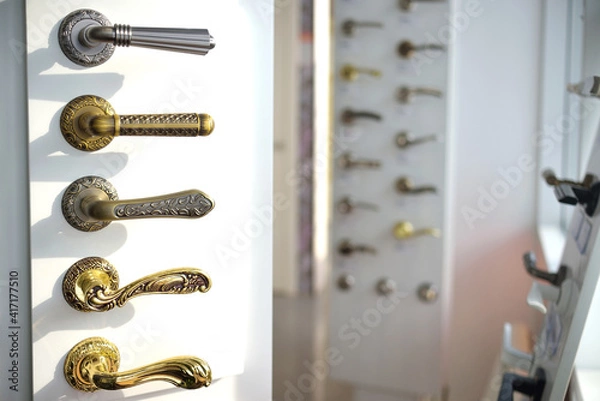 Obraz shop window with a large selection of handles for interior doors. accessories for doors. home renovation concept