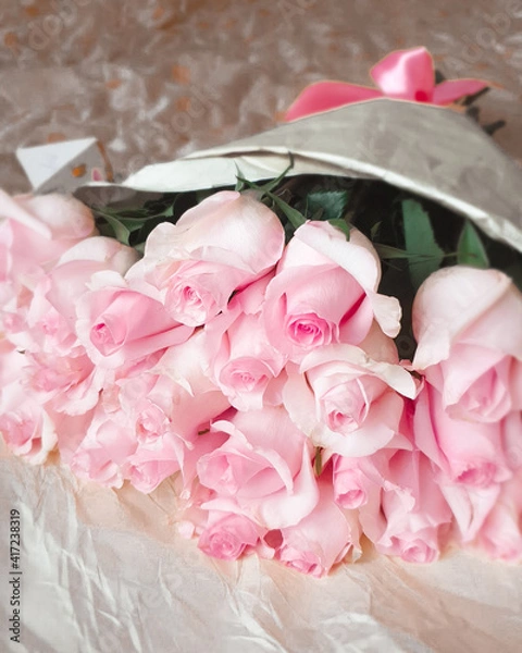 Obraz A bunch flowers of fresh light pink roses. Beautiful rose in a bud