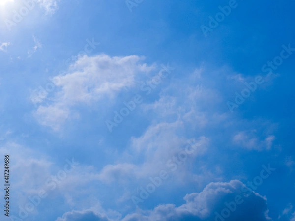 Obraz Clouds in the sky and light are coming down.