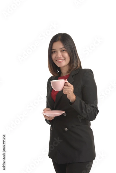 Obraz Asian business woman is holding a cup of coffee and expressing joy. On white Background.