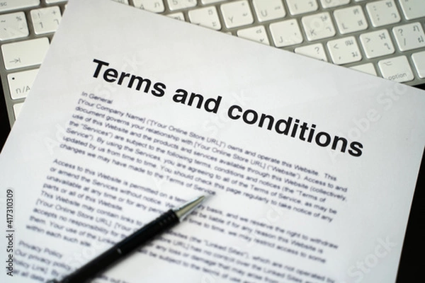 Obraz Terms and conditions businessman reviewing  terms and conditions of agreement office terms and conditions