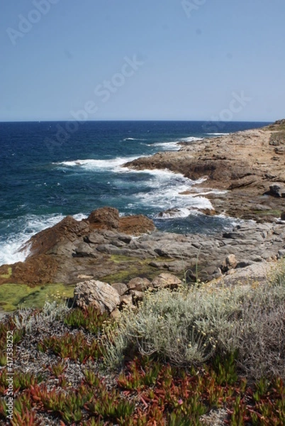 Obraz waves crashing on rocks