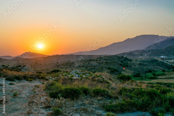 Fototapeta sunrise over the island
Beehive in the fields