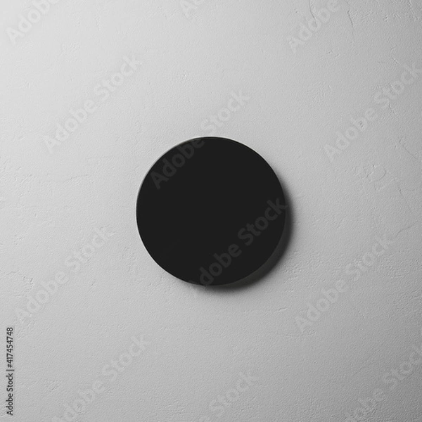 Fototapeta Black obsidian mirror on gray stone surface