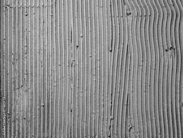 Obraz Texture applied tile adhesive on wall, ribbed concrete background close-up.