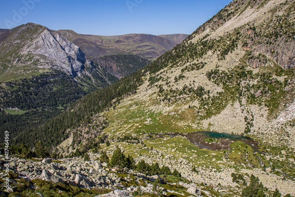 Obraz Small heavenly lake with crystal clear water surrounded by beautiful mountains in summer