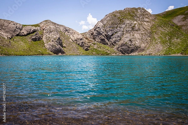 Obraz Panoramic view of a beautiful lake with turquoise blue water in summer, at the foot of the lake