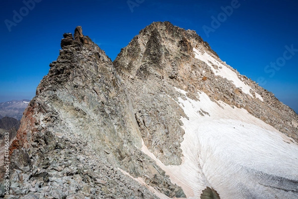 Obraz Snow-capped mountain top surrounded by a glacier