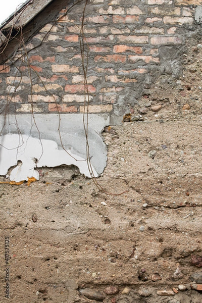 Obraz Poor wall repair for an old wall with a modern approach.