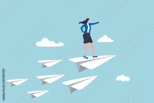 Fototapeta Business leadership, woman power to lead company to achieve target, smart confidence businesswoman standing on leading flying paper airplane origami pointing finger to the direction to reach goal.