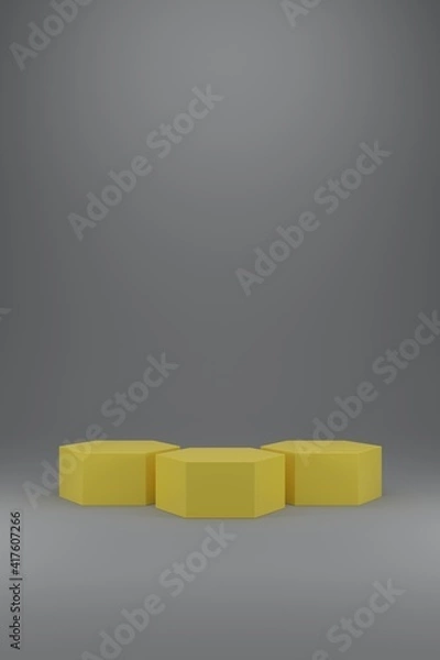 Obraz Three illuminating yellow hexagonal podium on ultimate gray background.