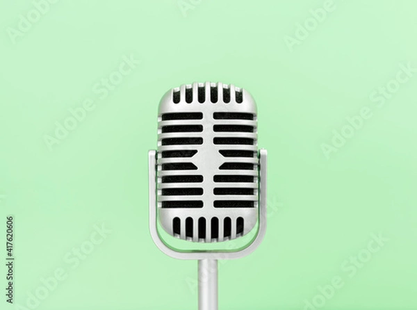 Obraz Microphone retro on green background
