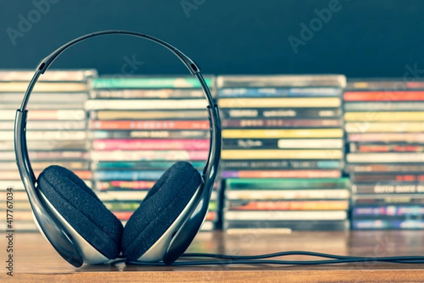 Obraz headphone on stack of cd background