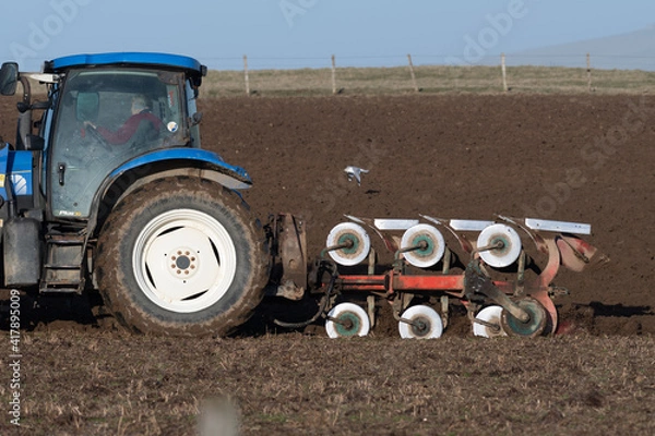 Fototapeta tractor ploughing