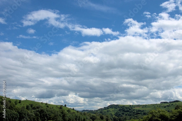 Fototapeta Clouds over the mountains