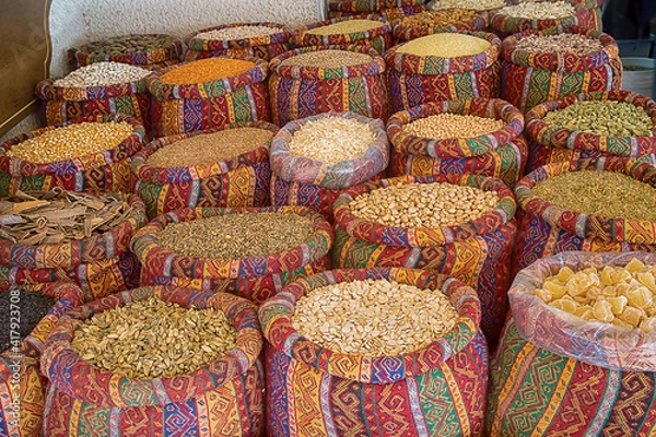 Obraz multicolored bags of cereals in the market of the east