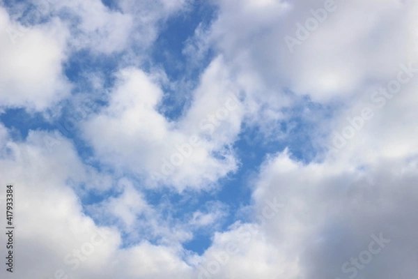 Fototapeta Deep blue sky with beautiful soft clouds