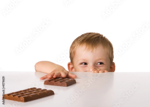 Obraz The child and a chocolate
