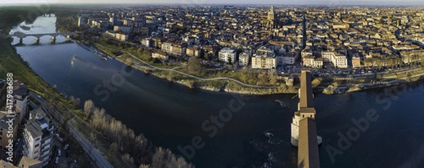 Obraz Classic aerial view of Pavia, Italy, in the afternoon: the dome and the old bridge on Ticino river