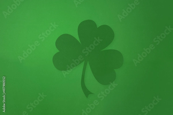 Fototapeta St Patricks day background. Shamrock clovers . With paper texture.
