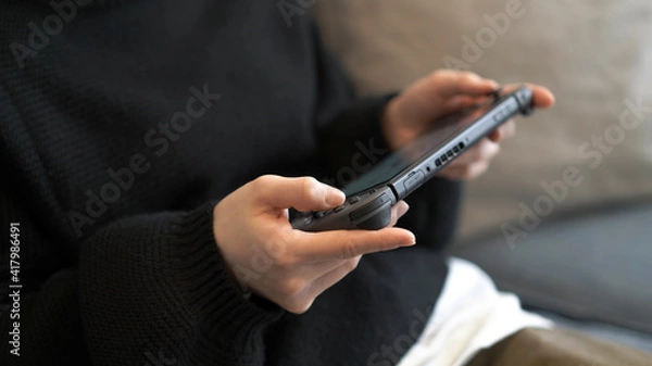 Fototapeta ゲームをする女の子