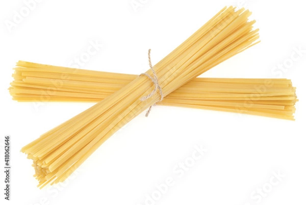 Fototapeta Bunch of pasta isolated on white background. spaghetti tied with rope