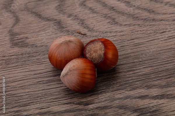 Fototapeta Hazelnut heap isolated over background