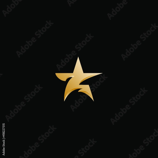 Obraz golden star on black background