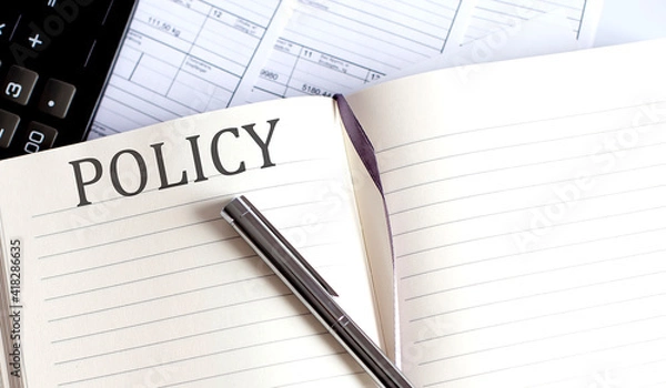 Obraz Notebook with Toolls and Notes about POLICY