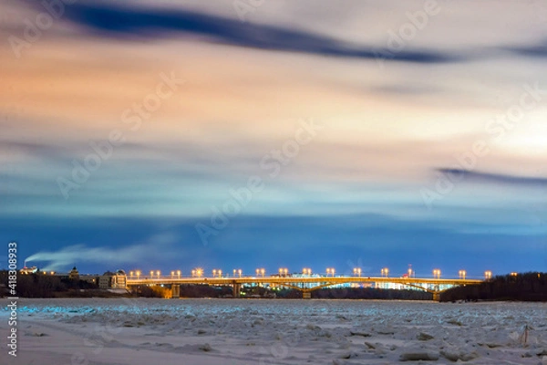 Fototapeta sunset over the river in winter in Omsk