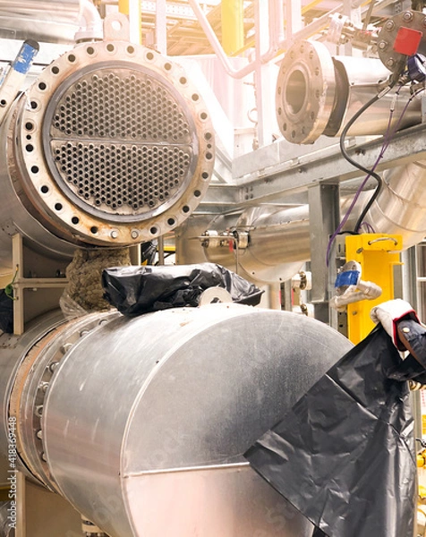 Obraz Remove the heat exchanger tube device. And is closing with a black bag.