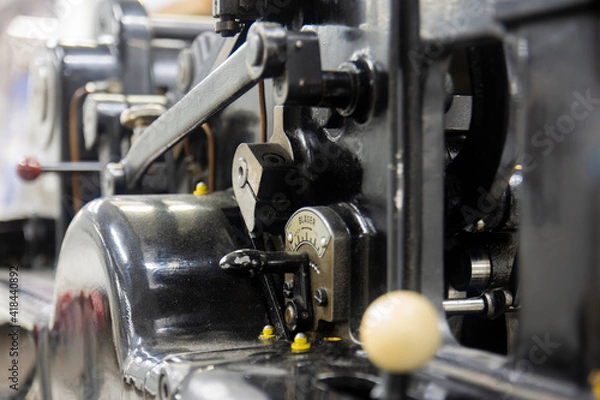 Fototapeta Heidelberg Cylinder printing and die cutting machine. different angle and close up to the parts.