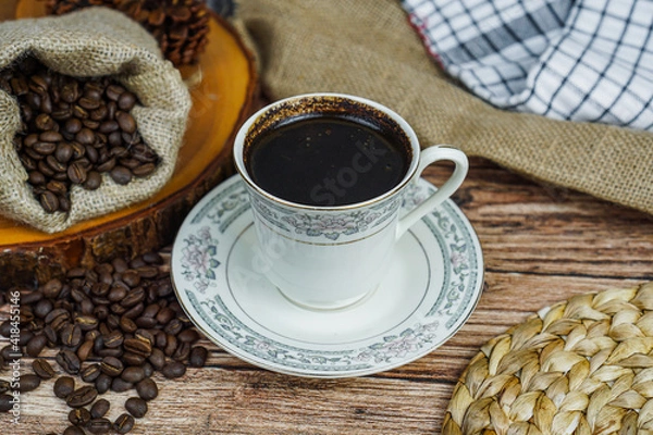 Fototapeta Coffee is a brewed drink prepared from roasted coffee beans, the seeds of berries from certain Coffea species. Drinking coffee can do much more than provide an energy boost.