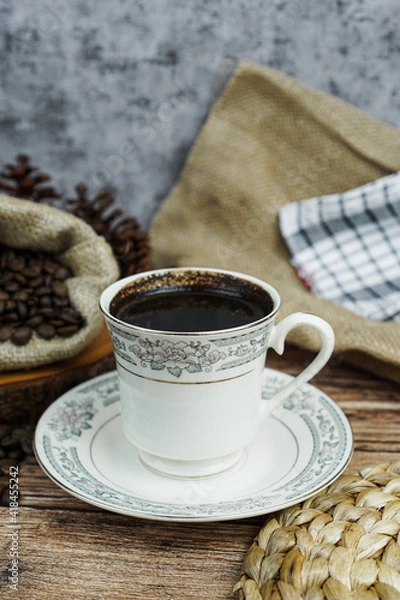 Fototapeta Coffee is a brewed drink prepared from roasted coffee beans, the seeds of berries from certain Coffea species. Drinking coffee can do much more than provide an energy boost.